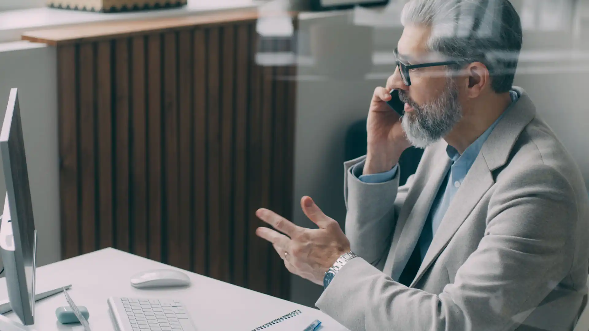 Man on phone contacting a business
